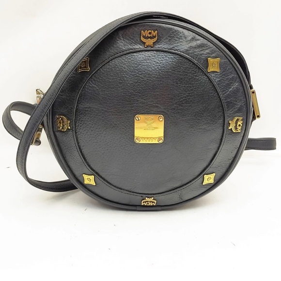 MCM Handbags - MCM Black and Gold Round Leather Crossbody